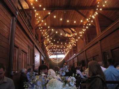 the reception barn decked with lights