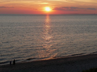 the sunset over Cape Cod Bay
