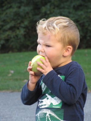 Lijah biting an apple