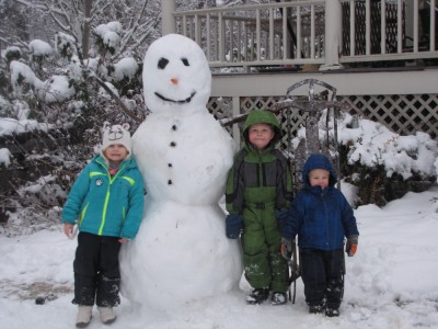Harvey, Zion, and their friend pose with my big snowman