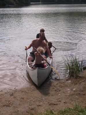 the canoe with Dan, Harvey, Nisia, and Uncle Tom
