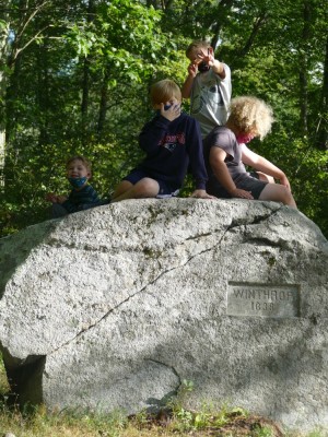 the boys and a friend atop one of the Two Brothers Rocks