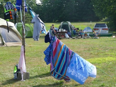 the campsite seen through the towel-bedecked clothesline
