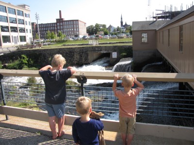 the boys looking down at the Swamp Locks, part of the Lowell canal complex