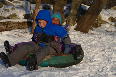 Harvey and Nisia on the snow tube