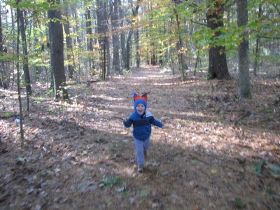 Lijah running in the woods