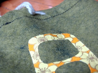 detail of the applique on a cord bag