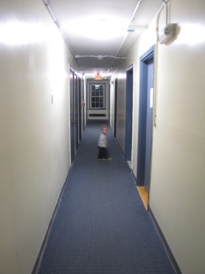 Lijah exploring the hallway in the dorm