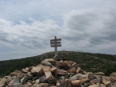 the cairn and sign at the top of Dorr Mtn