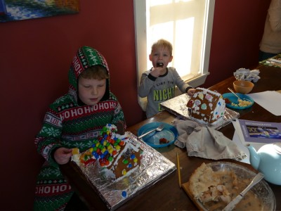 the boys starting to eat their gingerbread houses