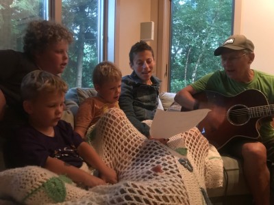 Leah and the boys singing with Grandpa Ira on the guitar
