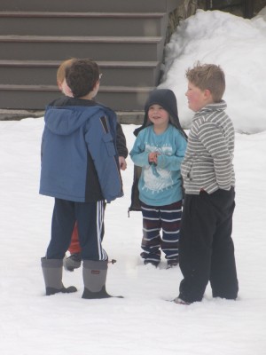 Harvey and Zion and friends standing in the snow