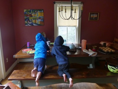 the boys at the breakfast table in sweatshirts