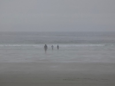 the boys and a friend on the beach in the fog