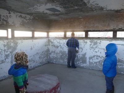 the  boys checking out an observation tower in the fort