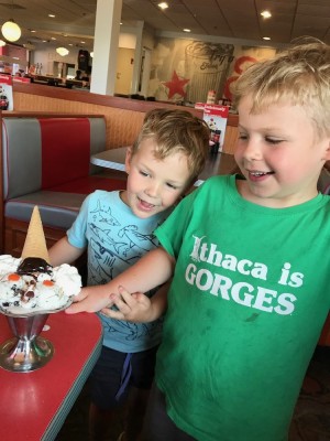Zion and Lijah looking at an ice cream sundae at Friendly's