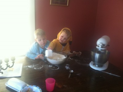 Zion and Lijah making gingerbread