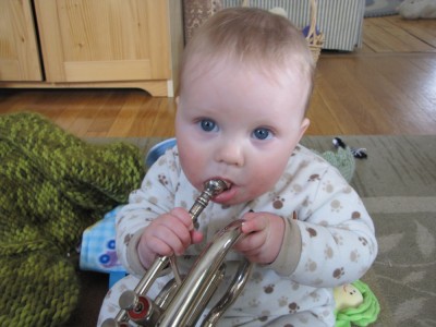 Harvey trying to play the cornet