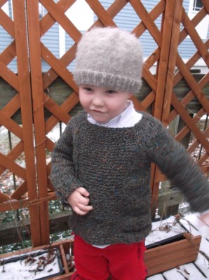 Harvey in his sweater on Grandma's porch--motion blur on his arms