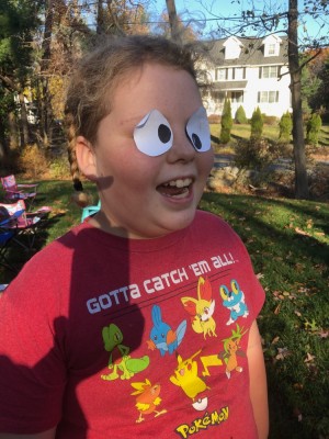 Harvey being silly with paper cartoon eyes taped to his eyes