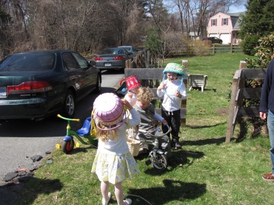 kids with easter baskets on their heads