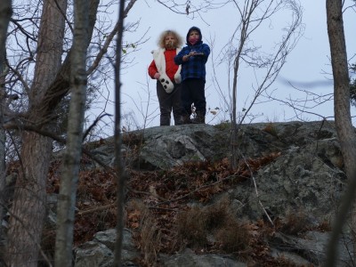 Harvey and Zion on a rocky hilltop by Horn Pond