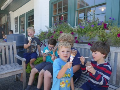 boys enjoying ice cream outside Bedford Farms