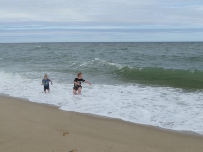 Harvey and Zion getting wet in the waves