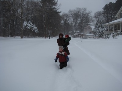 Harvey, Zion, and Mama walking down the snowy street