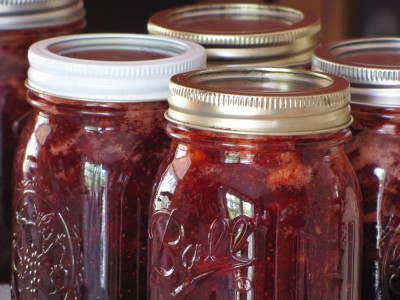 some finished strawberry jam in jars