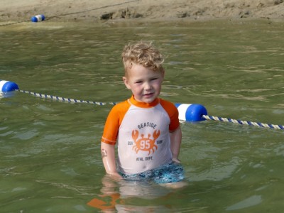 Lijah playing in the pond