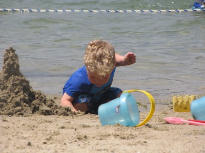Lijah working on a sand castle