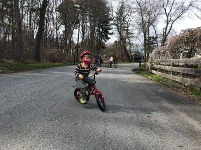 Lijah riding a two-wheeler for the first time