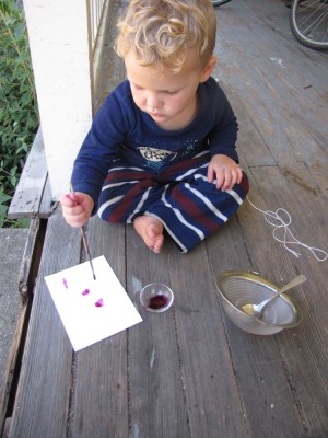 Lijah painting with pokeweed ink