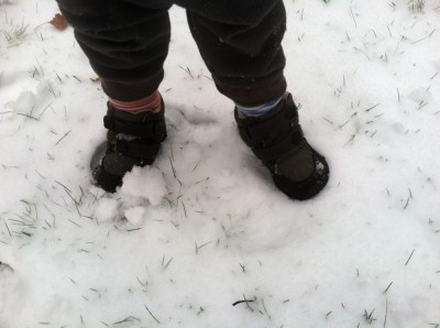 Lijah's booted feet in the snow