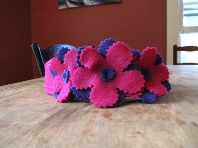 a headband in pink and purple flowers