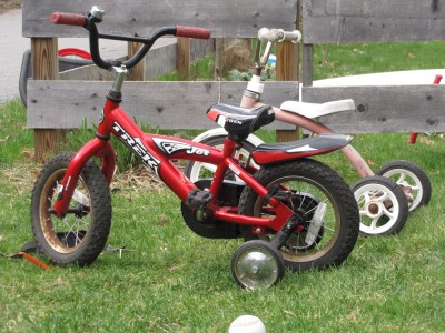 Zion's new bike: red 12-inch with training wheels