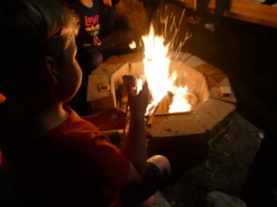 Zion toasting a marshmallow