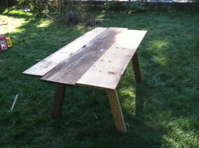 a picnic table made with scrap pine boards