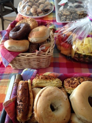 baskets of bagels and cookies in a buffet