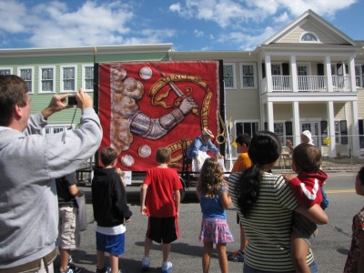 a float featuring the Bedford flag