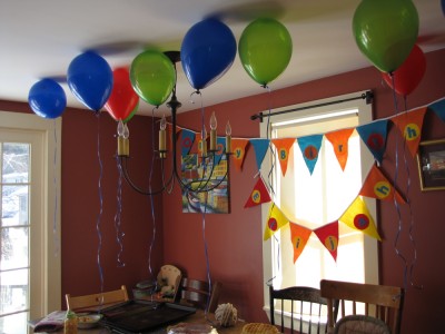 balloons and banners for Lijah's birthday