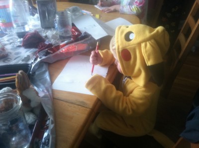 Lijah wearing a pikachu costume drawing
