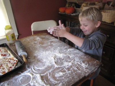 Zion playing with flour
