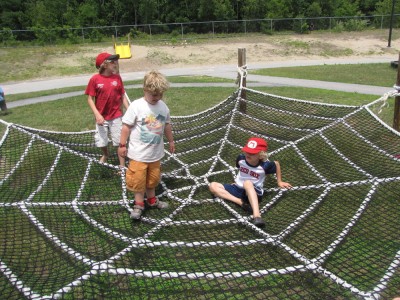 Harvey and friends on a plaground spider web