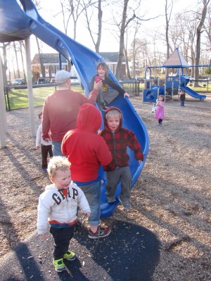 the boys by the slide at the playground