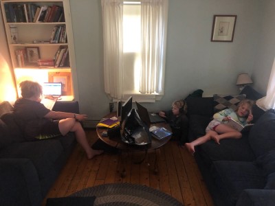 the boys reading and writing in the living room