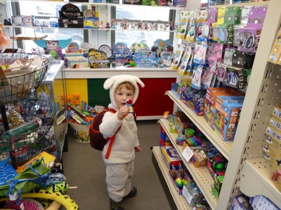 Lijah (in sheep costume) browsing in a toy store