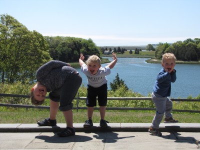 the boys showing off their silly poses in front of a salt pond