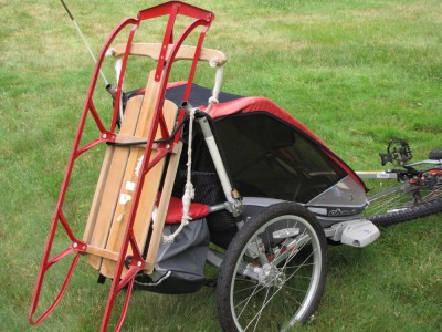 a sled on the back of the bike trailer